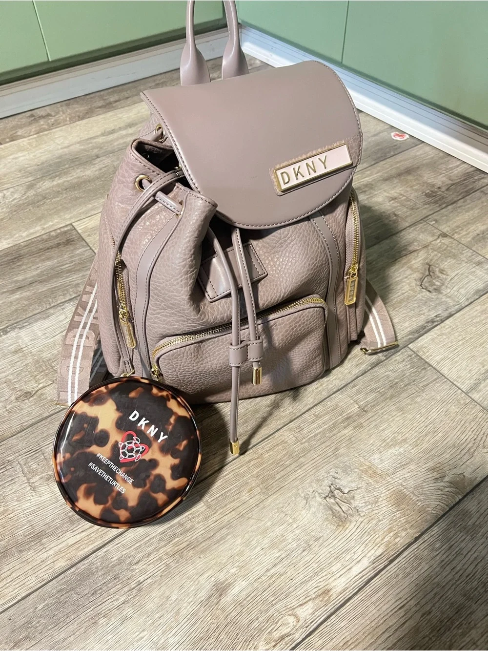 DKNY Mauve-Taupe Leather Drawstring Backpack with Gold Hardware